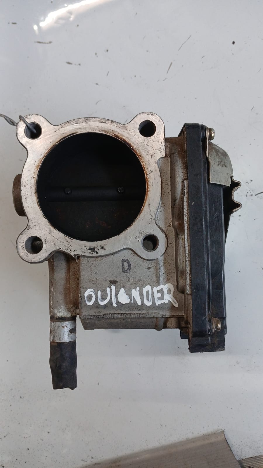 Cuerpo de aceleración Mitsubishi oulander
