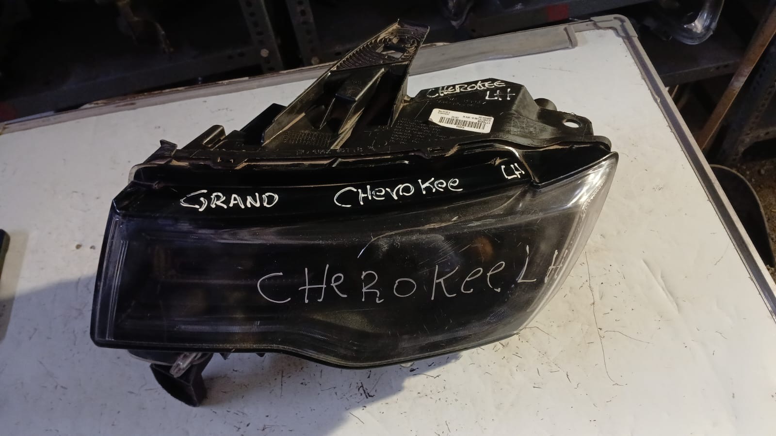 Optico izquierdo jeep grand cherokee